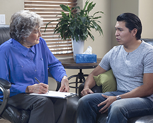 Man talking to therapist.