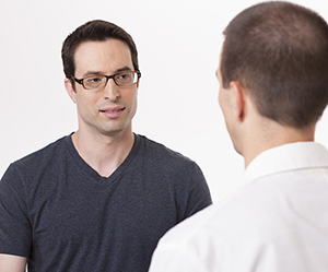 Man talking to healthcare provider.