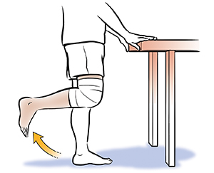 Person from waist down showing standing knee bends.
