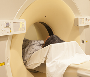 Woman having CT scan.